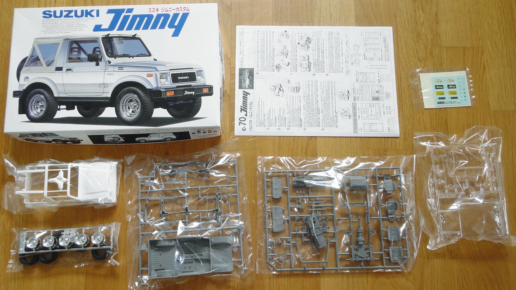 Suzuki Voitures modèles: Fujimi Suzuki Jimny Custom 1:24 – Neuf (Voir description) à Frümsen par Malibu69 1