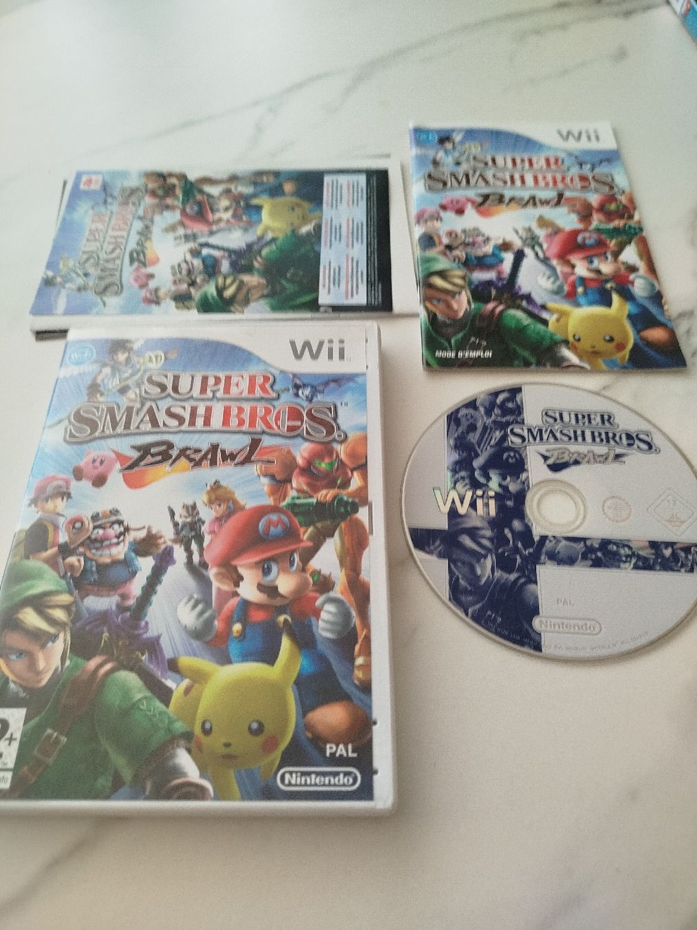 Nintendo Giochi: Super smashbros Brawl Wii  – Usato da Genève venduto da Octo-puces