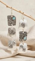 Orecchini argento design geometrico con pietre azzurre