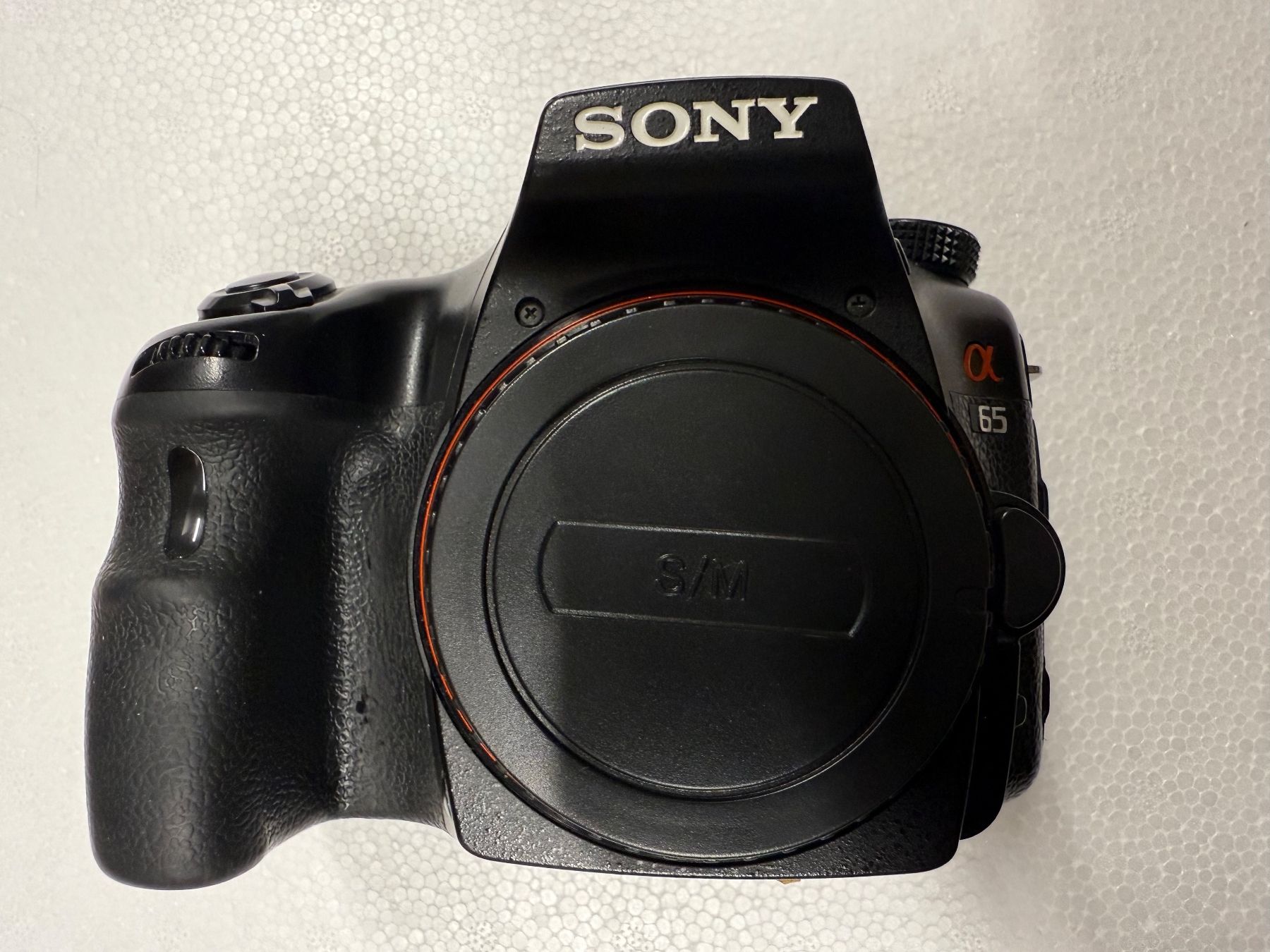 Sony Fotocamera: Sony Alpha 65 Spiegelreflexkamera.+ 2 Objektive + Akku + Lad – Usato da Zürich venduto da pnp_jz9v 1