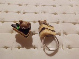 Kinder-Fingerring Kuchenstück, mit Bärenkopf