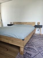 Wooden Bed with 2 night stands and lamps