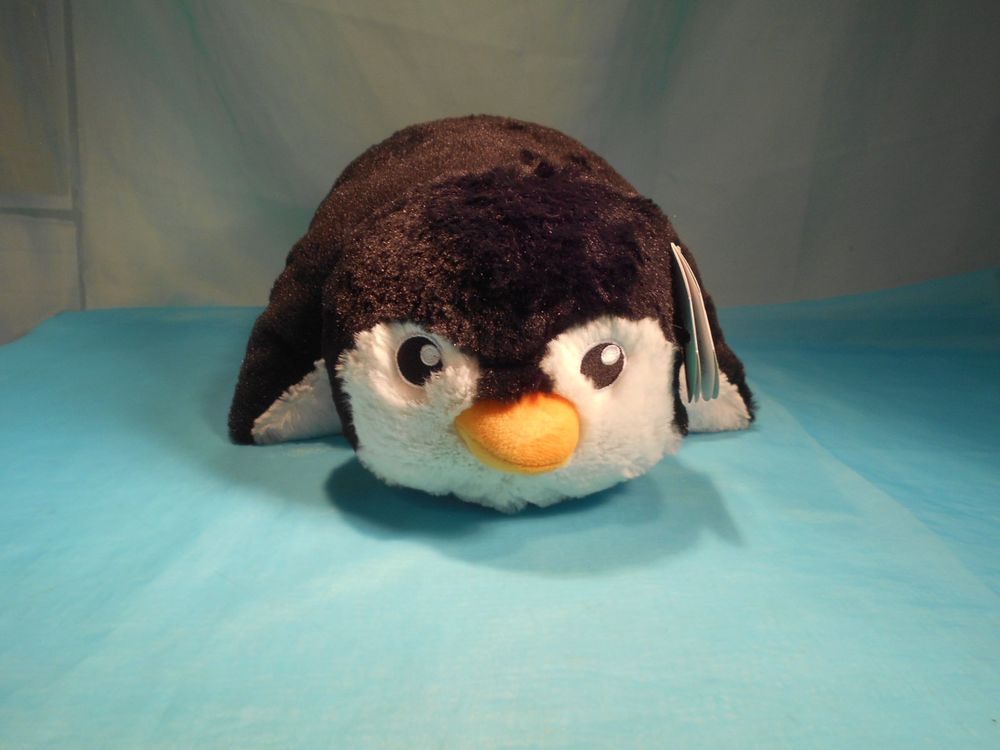  Pinguin. Plüschtier und Kissen zugleich 
