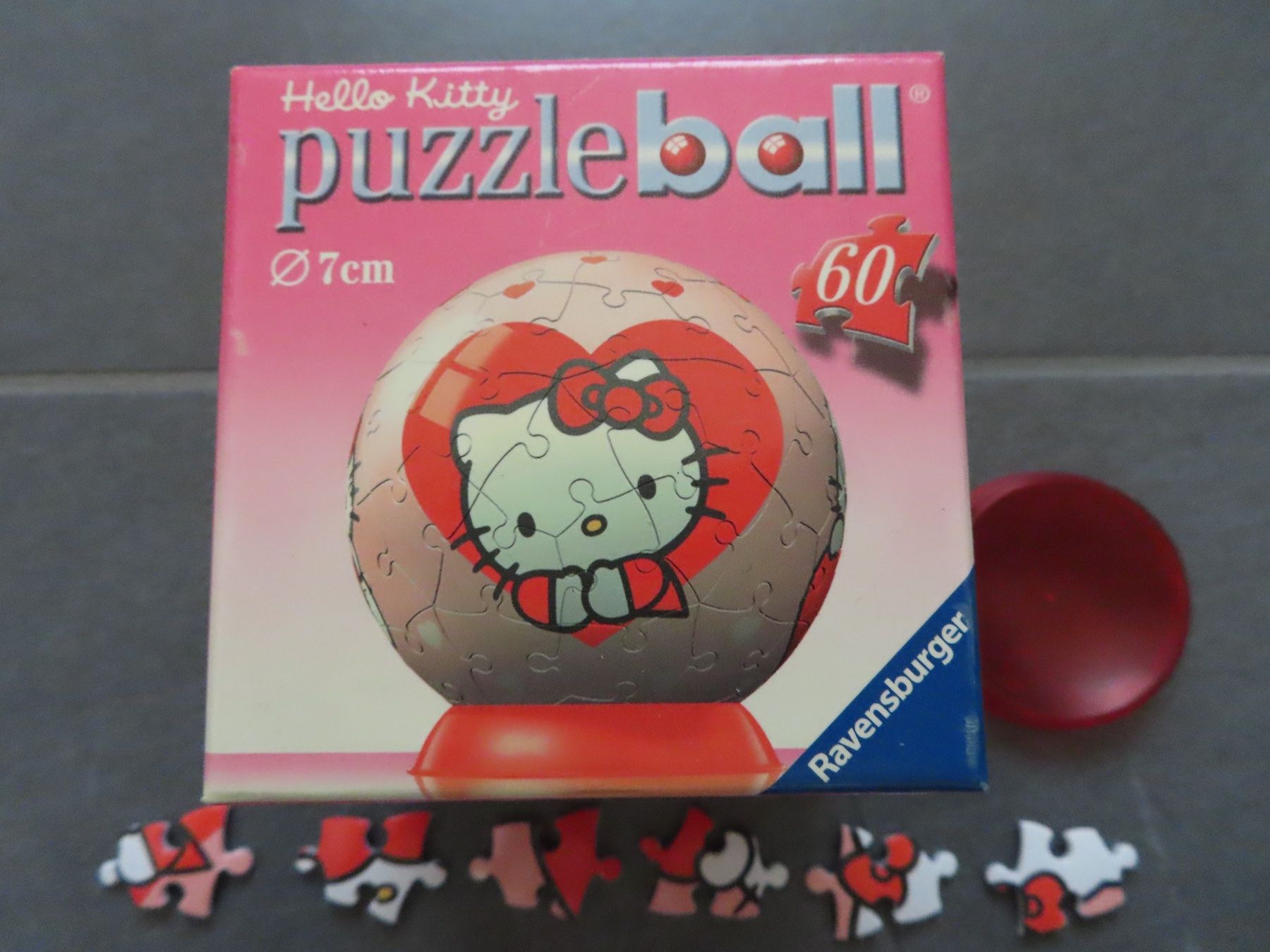 Ravensburger Puzzle: HELLO KITTY Puzzleball 60 Teile – Usato da Wallenried venduto da Asyano