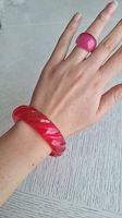 pinker Armreif und Fingerring