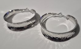 Orecchini a cerchio martellati argento donna
