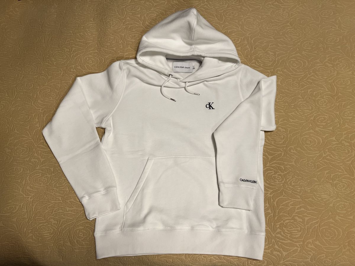 Calvin Klein Pullover & Sweatshirts: Sweat à capuche Calvin Klein blanc, taille L comme neuf – Gebraucht aus GENÈVE von triple7ch
