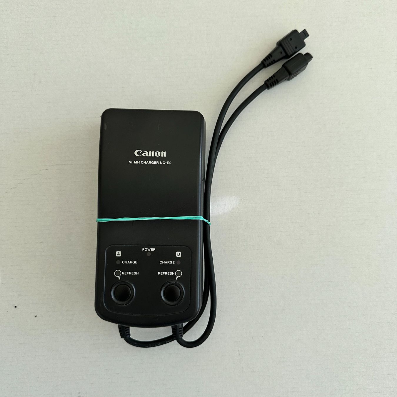Canon Altri Accessori: Canon NC-E2 Ladegerät – Usato da Herzogenbuchsee venduto da Discussoft