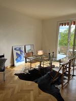 Esstisch mit Glasplatte und Metall-Holz-Gestell