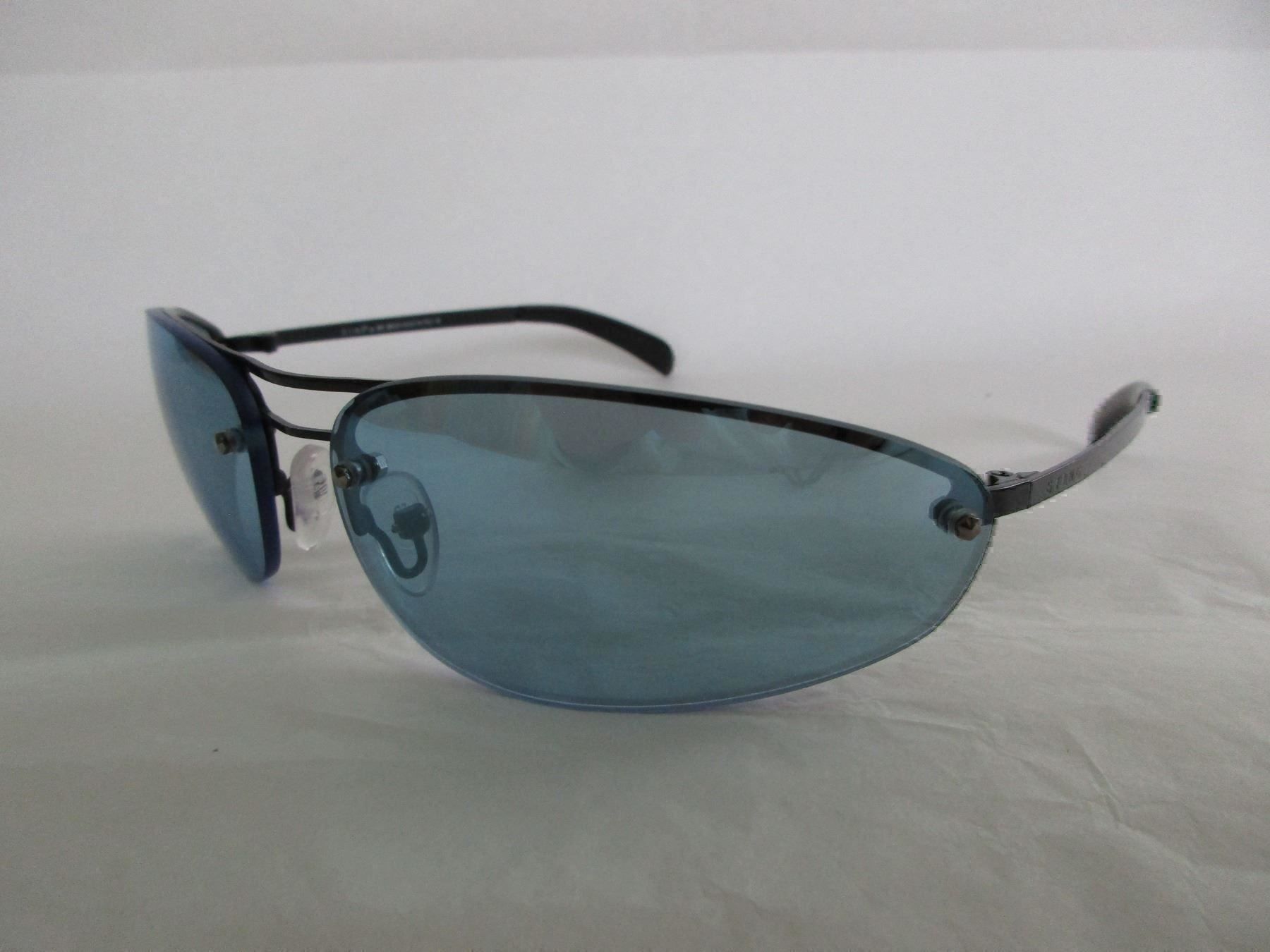 Brillen & Gläser: STING Sonnenbrille mit Melanin UV-Schutz – Neu und originalverpackt aus Aadorf von condor35