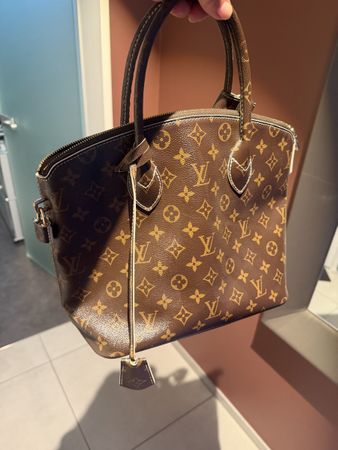 Titel  Louis Vuitton Lockit MM Limited Edition Fetish Monogr