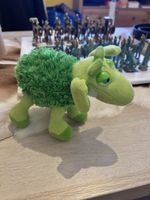 Adorable Green Plush Toy – Perfect for Winter Cuddles!