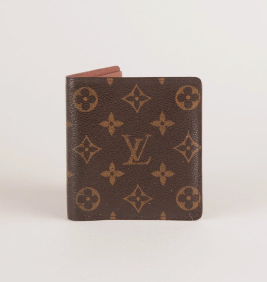 Louis Vuitton Portafogli: Portefeuille vertical Monogram Louis Vuitton – Usato da Delémont venduto da Le38.shop