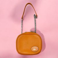Sac à main Lacoste cuir orange bandoulière chaîne argentée