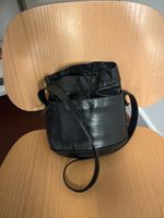 TL 180 black leather bucket 90s style bag