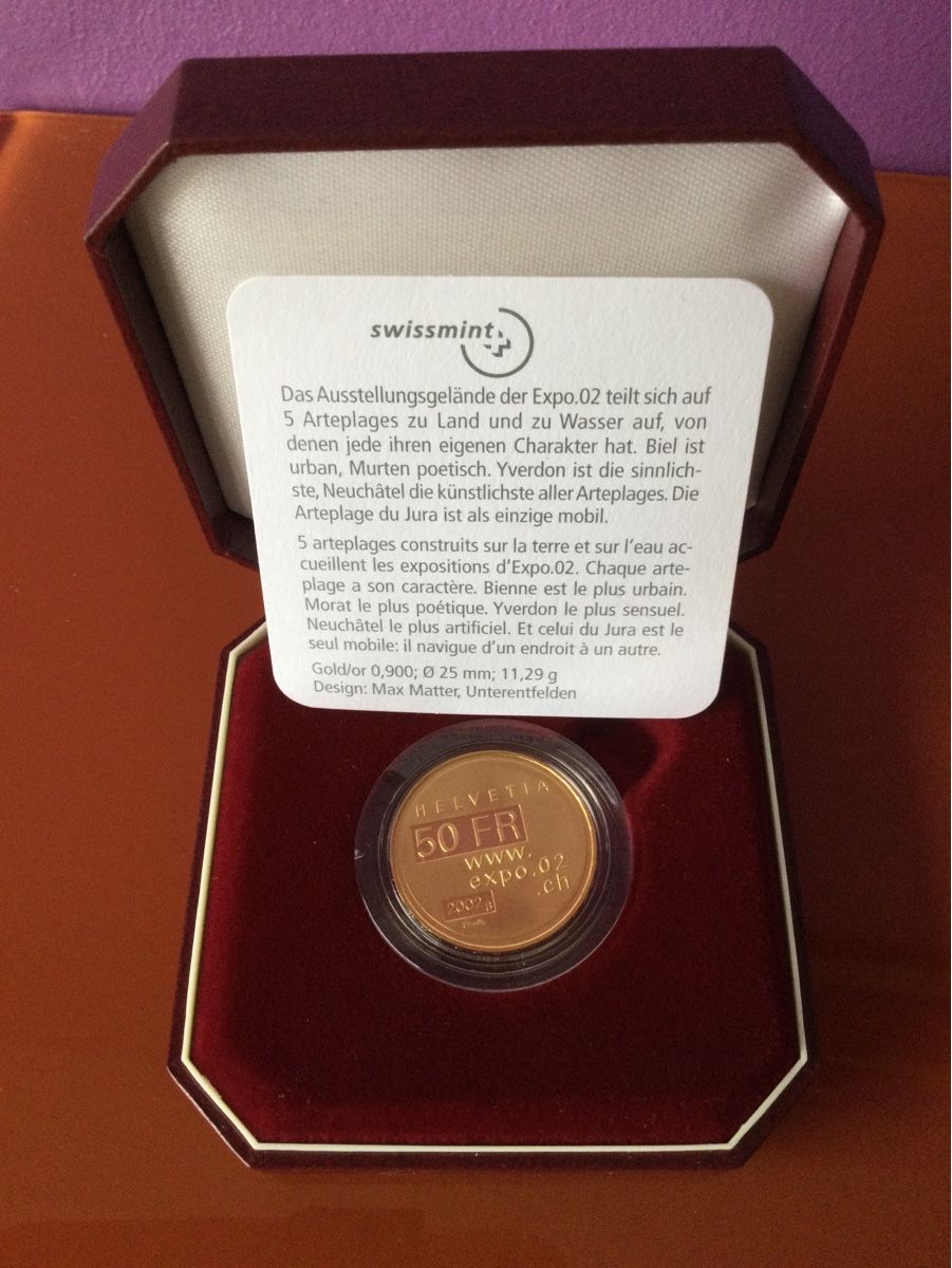 Tutti le monete: 50 Fr. Pièce en or commémorative 2002 Expo.02 – Nuovo e nell'imballaggio originale da Vesin venduto da Erwy