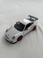 Mini und grosser Porsche 911 GT3 RS