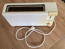 Toaster, funktionsfähig  gebraucht/eine Seite etwas verfärbt