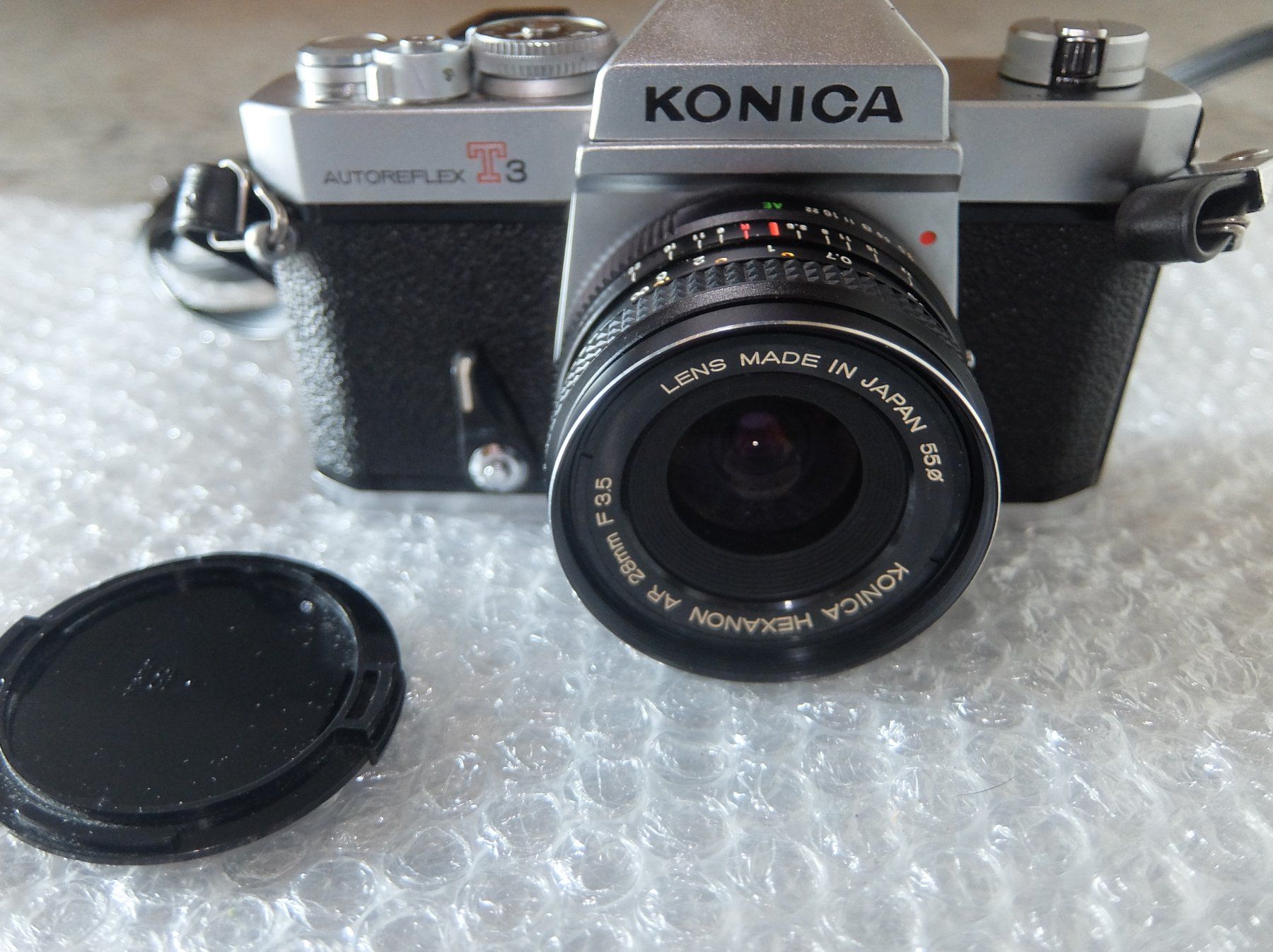 Konica Fotocamera: Konica Autoreflex T3 Kamera mit Objektiv und Blitz – Usato da Basel venduto da Elektronik_Markt 2