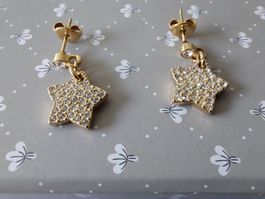 SWAROVSKI: Ein Paar Ohrhänger Sternenform, viele Zirkonias