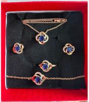 Ensemble forme fleur - plaqué or avec zircon et pierre bleue