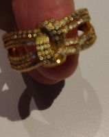 Bague nœud avec zircons bon état