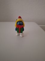Weihnachtsschlumpfinchen mit kurzem Mantel