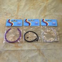 LOT SCHMUCKBAND SCHWARZ-VIOLETT-TRANSPA.