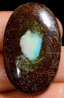 Cabochon L-4538 – Boulder Opal 31,5X20X5mm 36 Karat