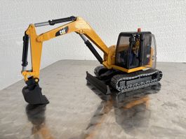 Bruder Kettenbagger CAT Modell gelb gebraucht