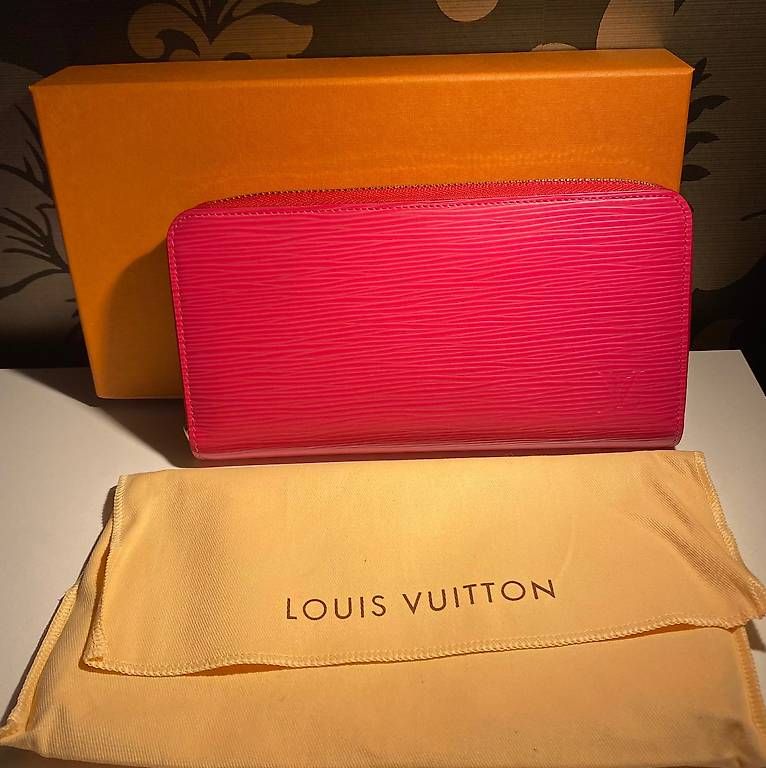 Louis Vuitton Portamonete: LV borsello Zippy – Usato da Sorengo venduto da at217