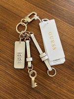 Schlüsselanhänger Guess 1981 beige goldfarben neu mit Etiket