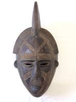 Masque de Côte d'Ivoire en bois sculpté art authentique