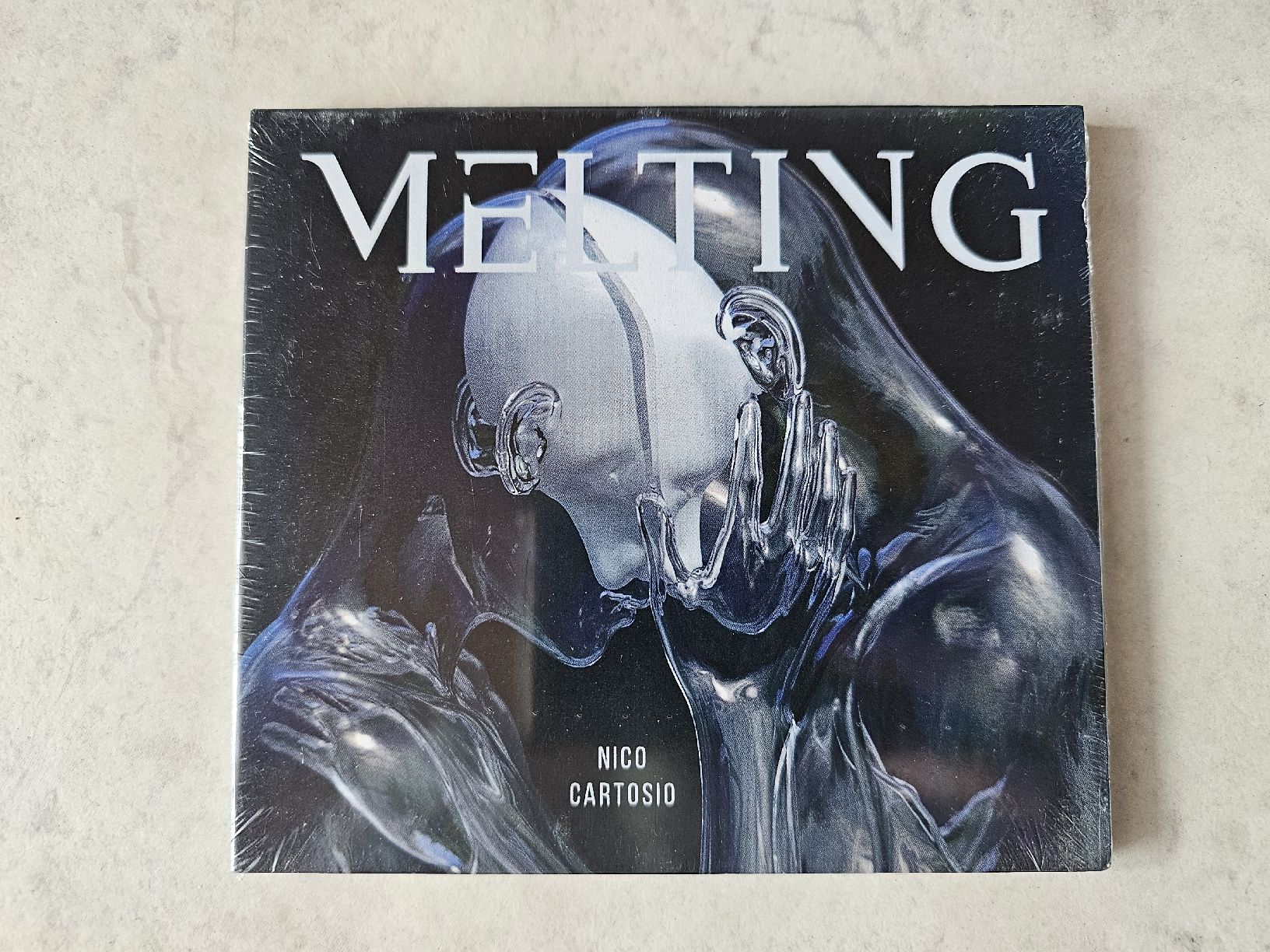 CDs: Nico Cartosio  -  Melting  /  Fabrikneu – Neu und originalverpackt aus Schneisingen von backstore24