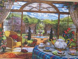 SCHMIDT PUZZLE " BLICK AUS DEM WINTERGARTEN INS GRÜNE ".