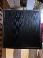 Coffee table in black wood with metal frame