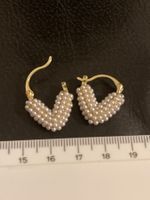 Jolies boucles d’oreilles dorée petites perles neuves