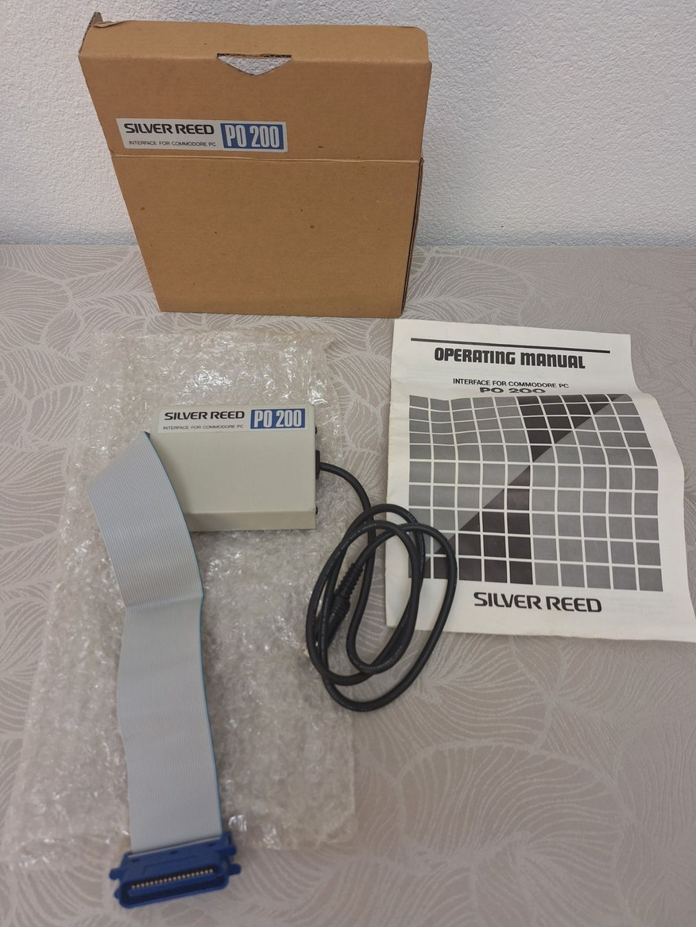 Componenti elettronici: Commodore Drucker Interface Silver Reed PO 200 – Usato da Zürich venduto da Lemon007