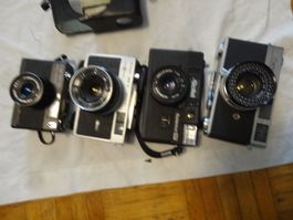 4 STK ANTIK FILM KAMERAS--CANON -ROLLIE-CARENA-RICOH.LÄÜFT