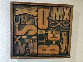 Vintage Collage aus Holzdruckbuchstaben