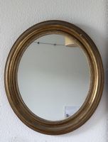 Antiker goldener Spiegel mit Verzierungen