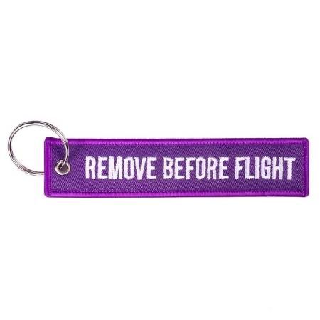 Portachiavi: Schlüsselanhänger REMOVE BEFORE FLIGHT violett – Nuovo e nell'imballaggio originale da Bern venduto da aeroshop.ch