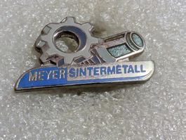 Ansteckpin 202: Meyer Sintermetall