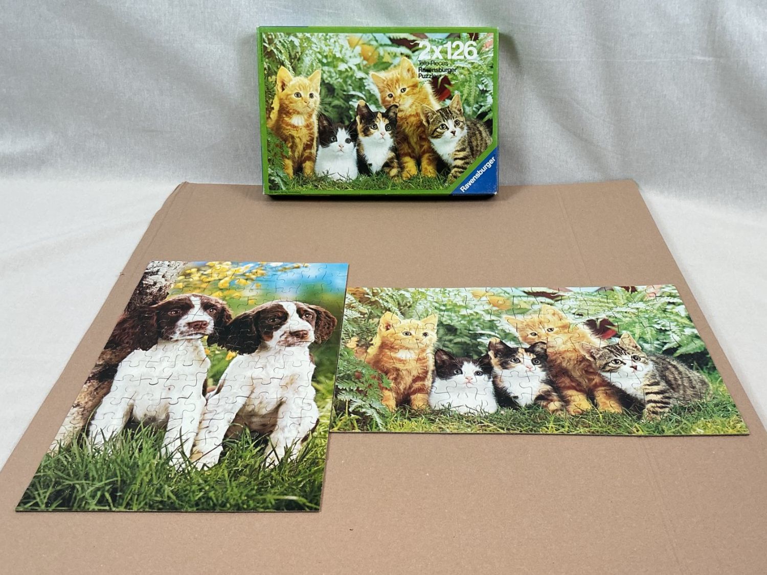 Ravensburger Puzzle: RAVENSBURGER Hund und Katzen Puzzle 2x126 – Usato da Richterswil venduto da Restwert_Richterswil