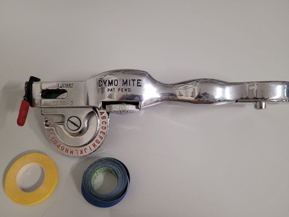 DYMO MITE Prägegerät 12 Mm – Typenrad INTERNATIONAL, Gehäuse Chrom, Defekt/als Ersatzteil