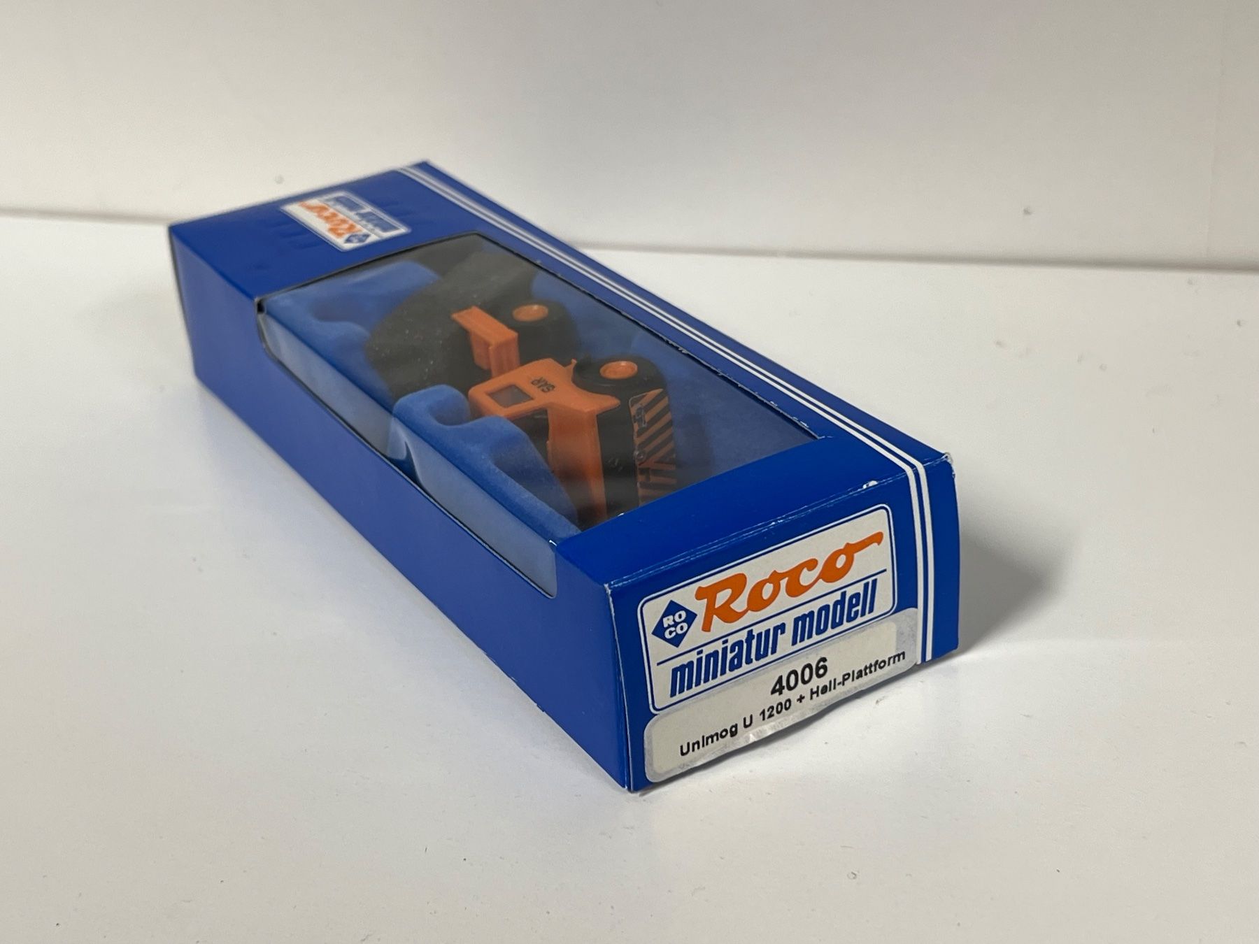 Roco Modellini di ferrovie: Roco 4006 Unimog U 1200 + Hell-Plattform H0 – Nuovo e nell'imballaggio originale da Neuenhof venduto da ludovicco 2