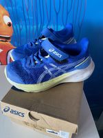 Asics GT -1000