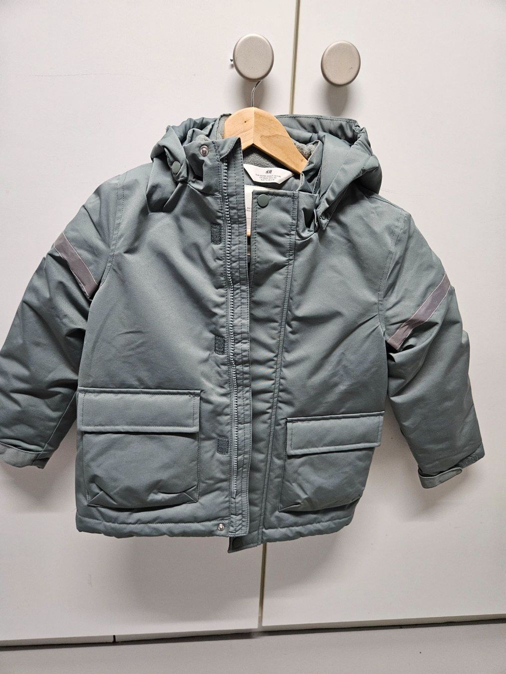 H&M Giacche & Cappotti: Winterjacke 122/128 neu – Usato da Hünenberg venduto da lexli06 2