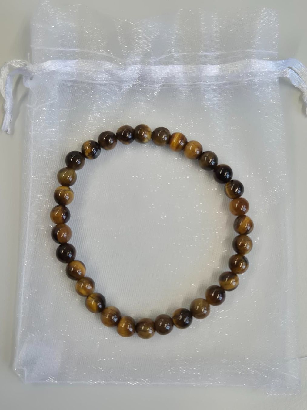 Bracciali & Braccialetti: Tigerauge Armband 6mm – Nuovo e nell'imballaggio originale da Rüti ZH venduto da pep_l9zp