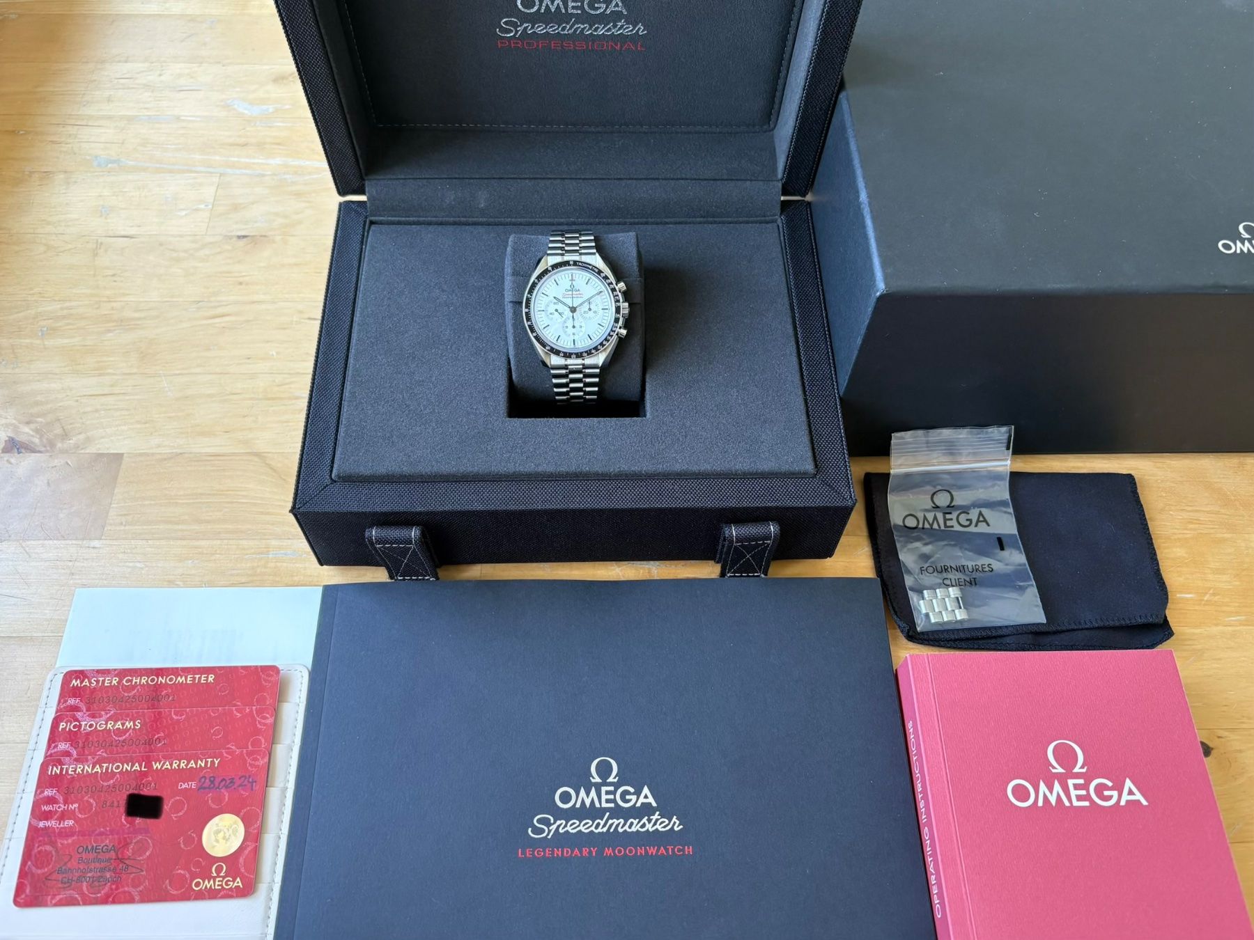 Omega Orologi: OMEGA Speedmaster Moonwatch White Fullset mit Garantie – Usato da Birsfelden venduto da Mynos 1